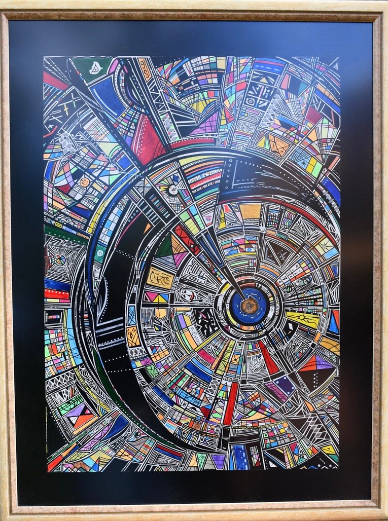 Rosace — composition radiale à l’encre et au marqueur sur fond noir, encadrée, par Marc Raineri